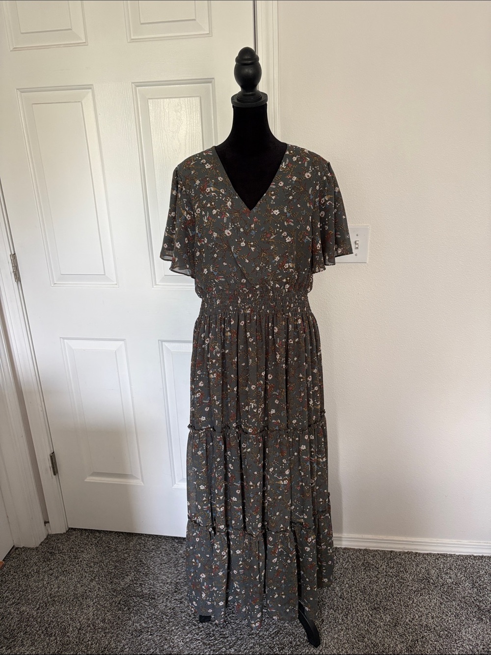 Mikarose gray floral print V-neck maxi dress featuring a smocked bodice and tier
